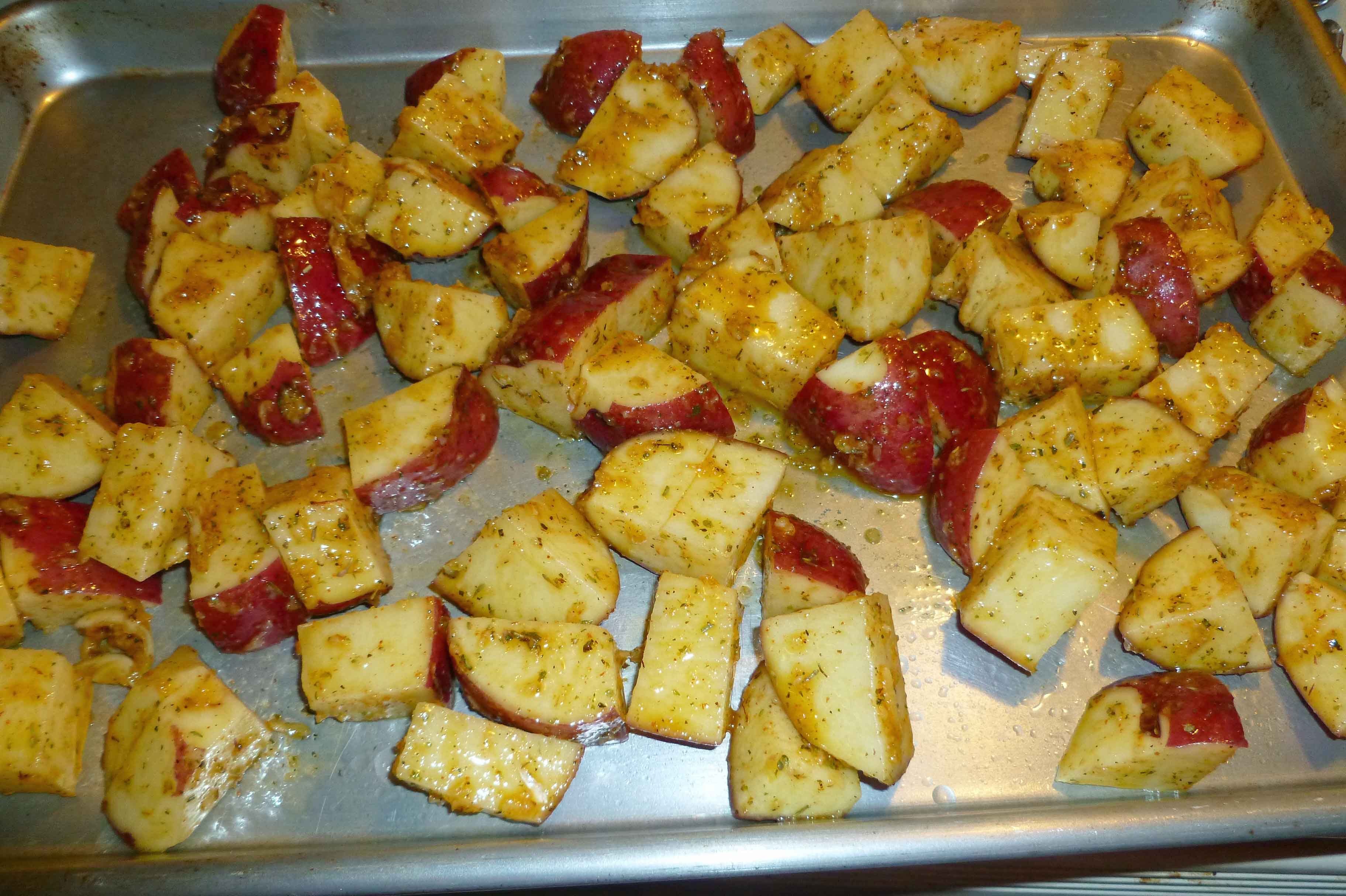 Coated Potatoes on baking sheet in single layer