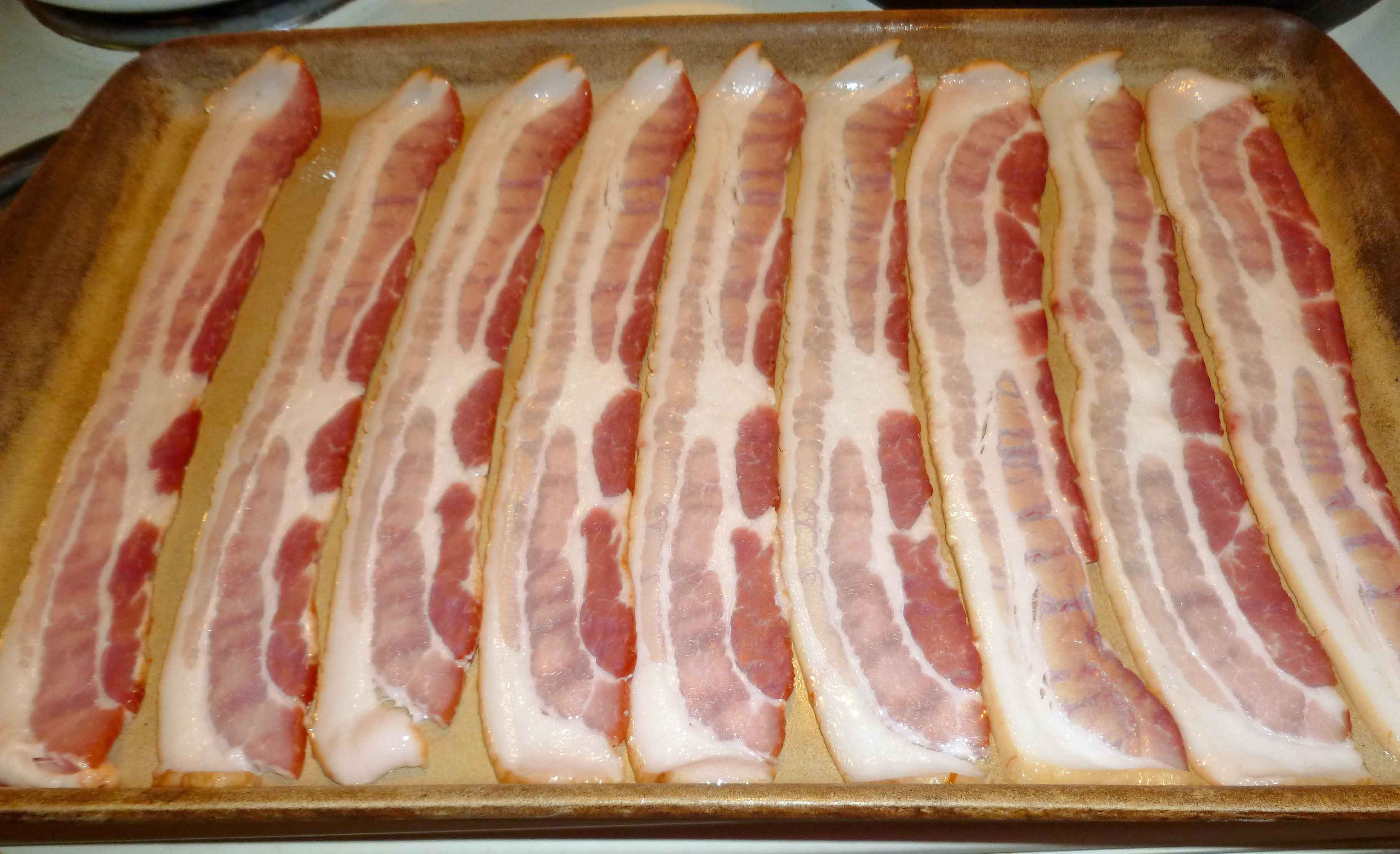 Bacon laid out on stoneware