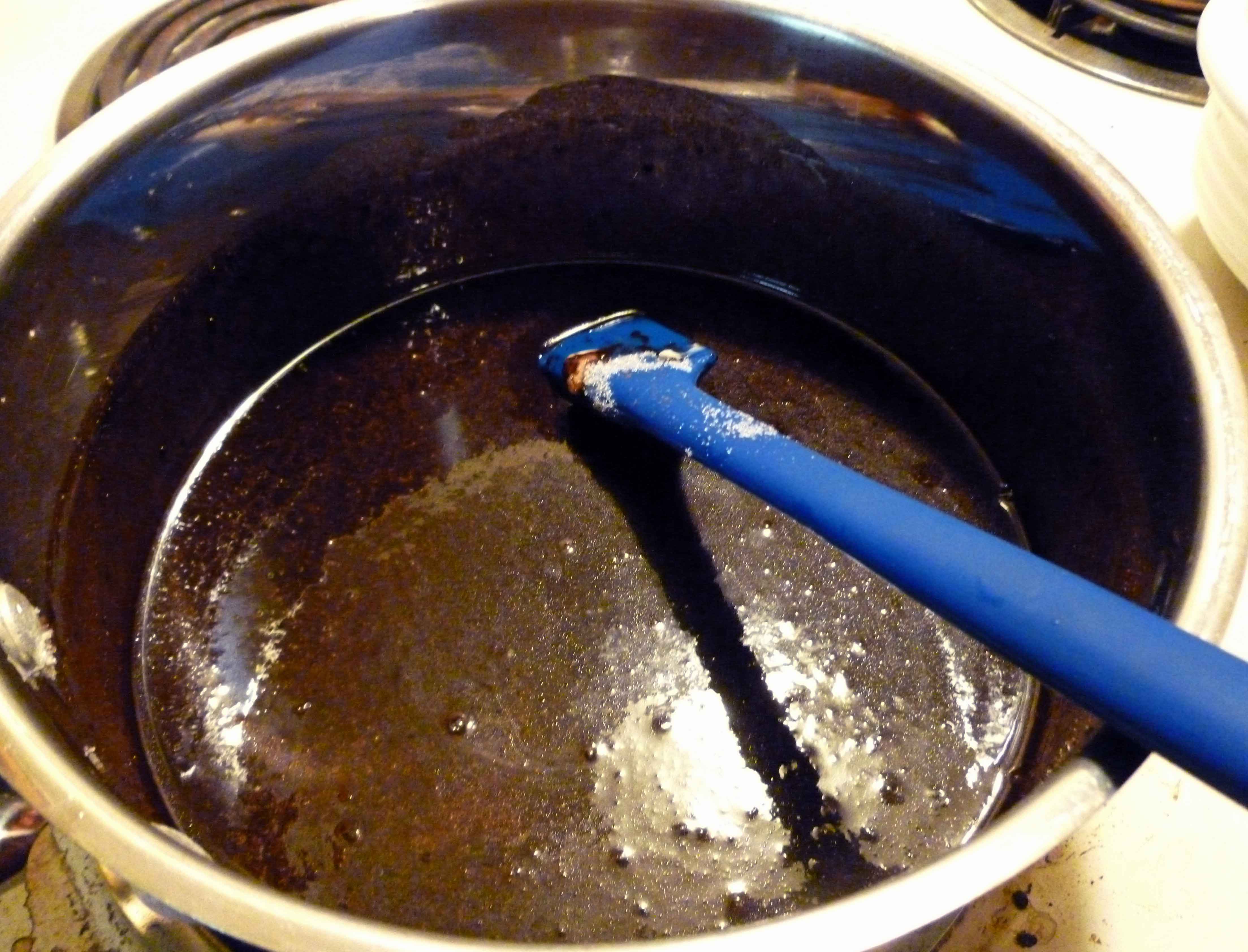 Melted shortening, sugar, coffee and cocoa powder in saucepan