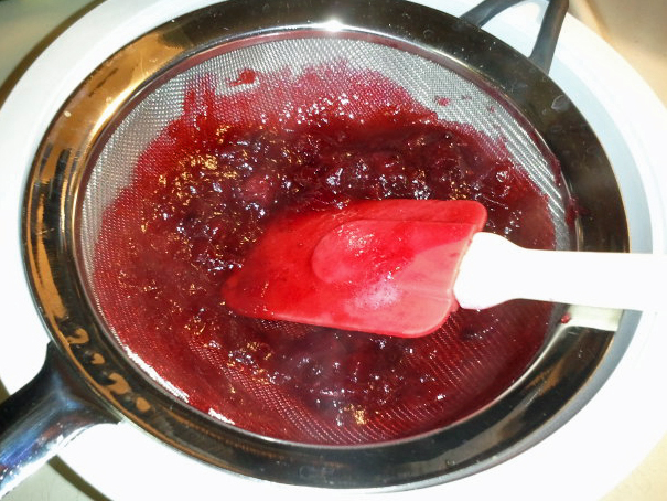 Using Strainer to remove seeds and skin