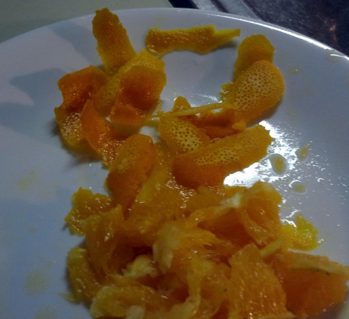 Zest and Sectioned Orange Pieces