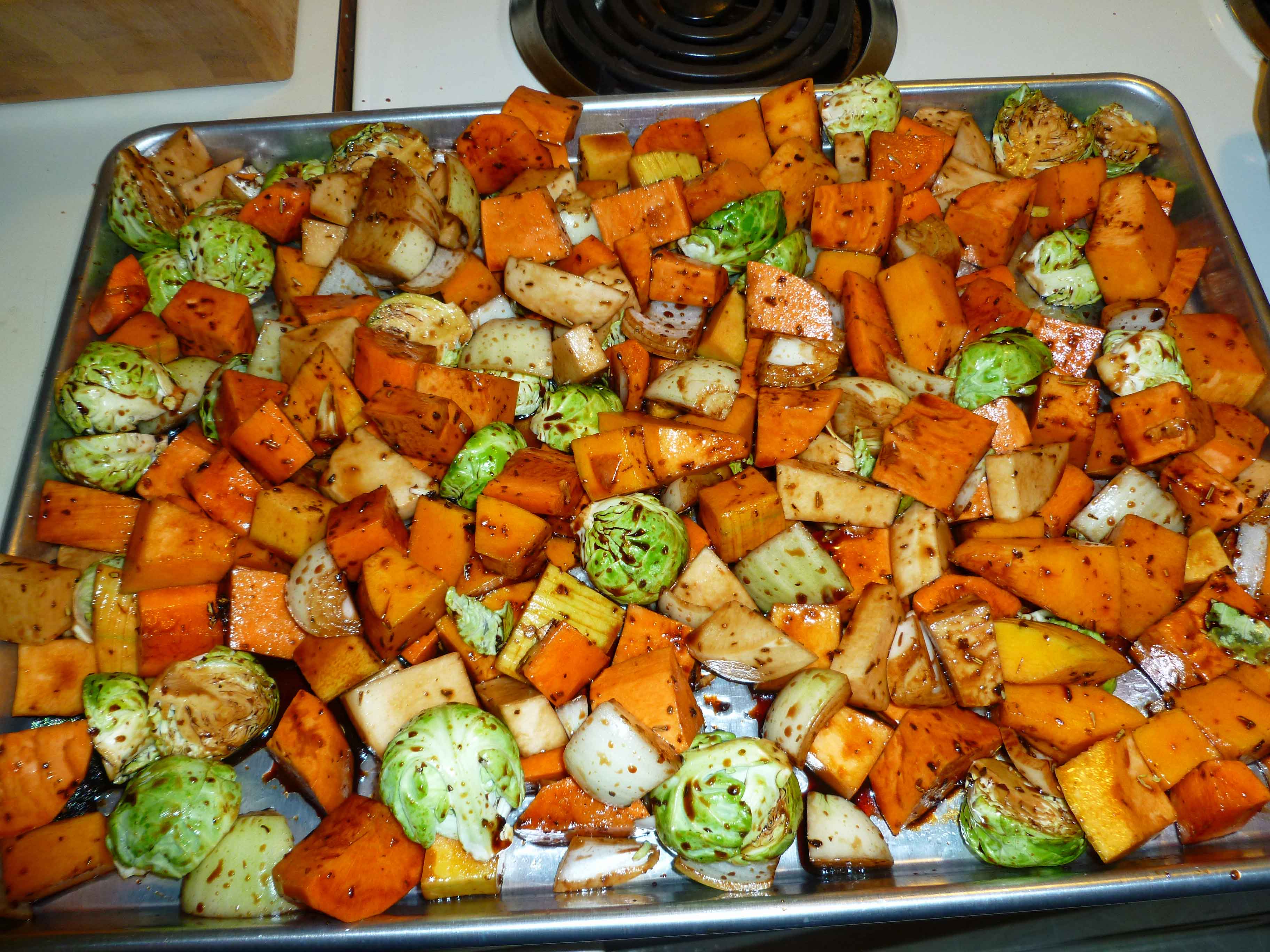 Veggies spread evenly on pan