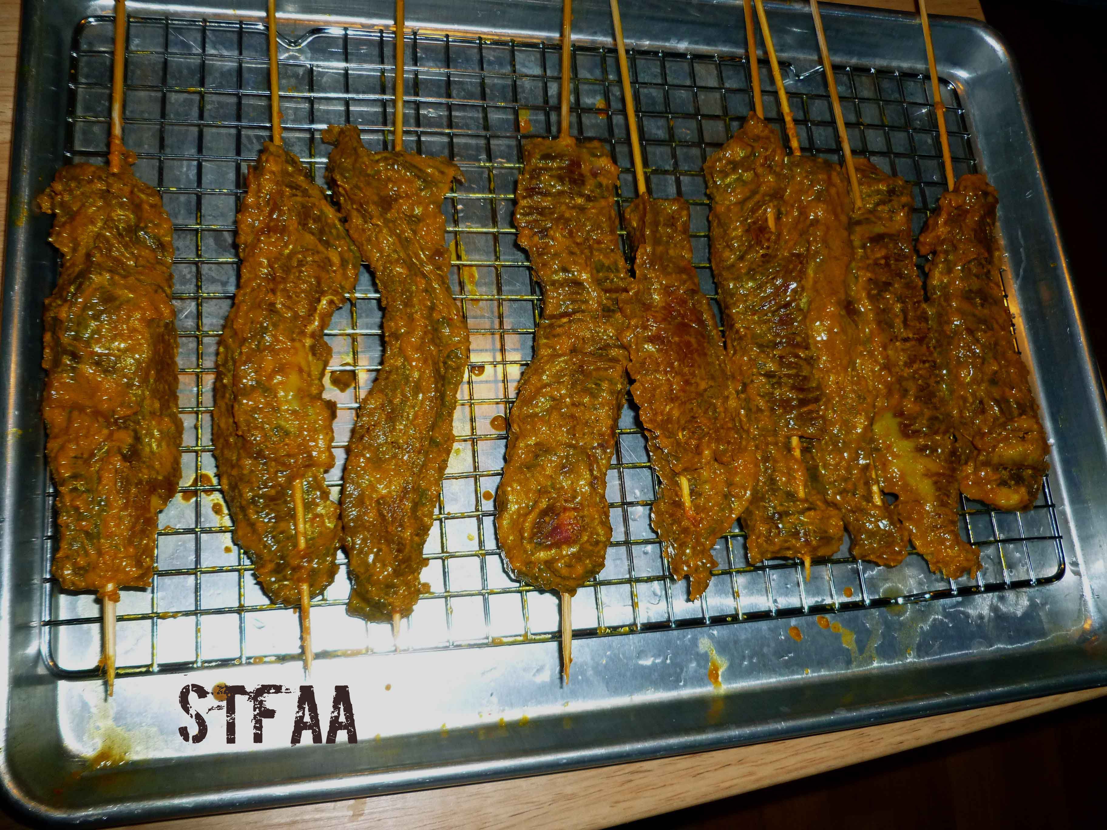 Flank steak skewered but before cooking