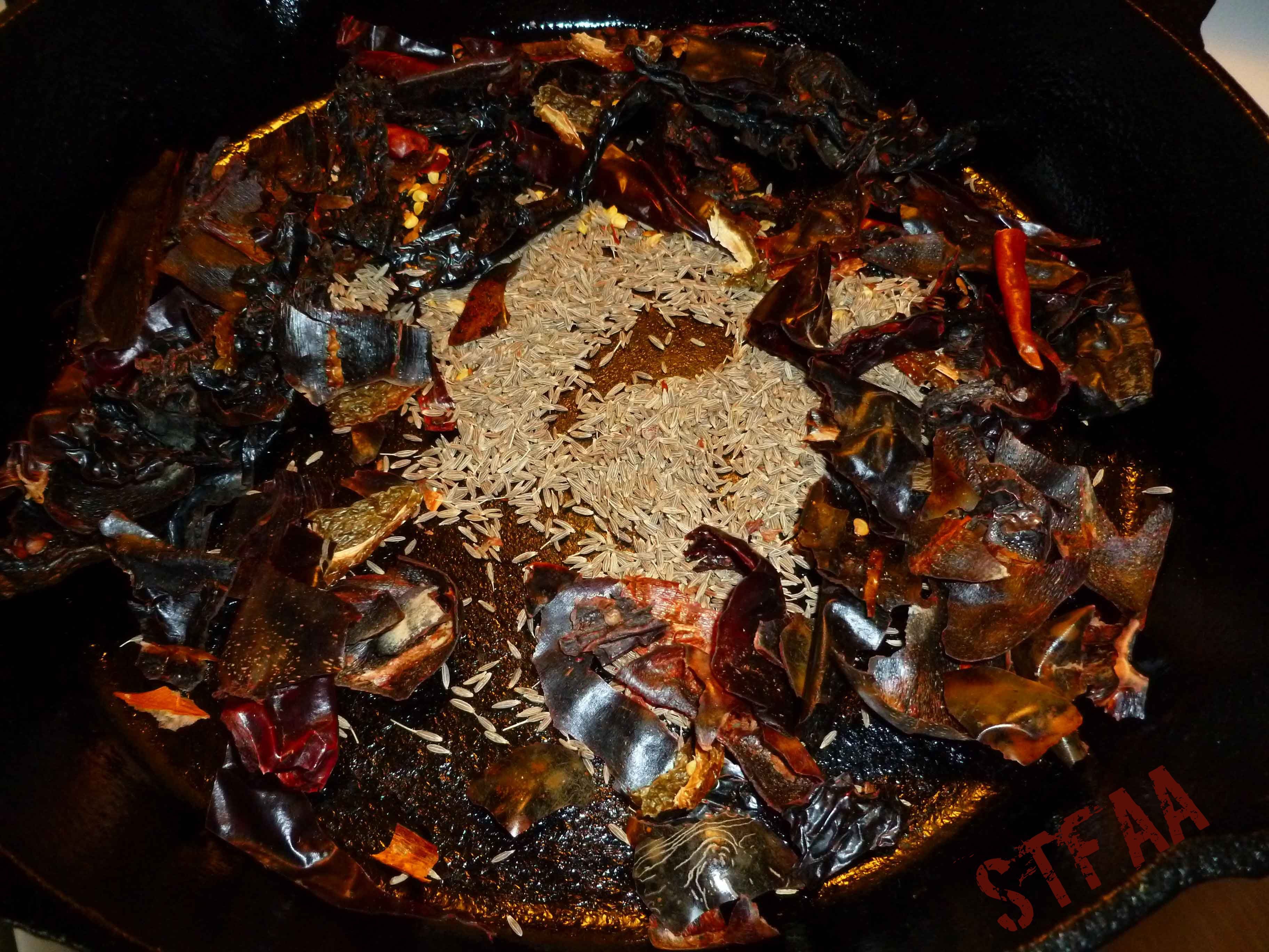 Dried chiles and cumin seed before toasting