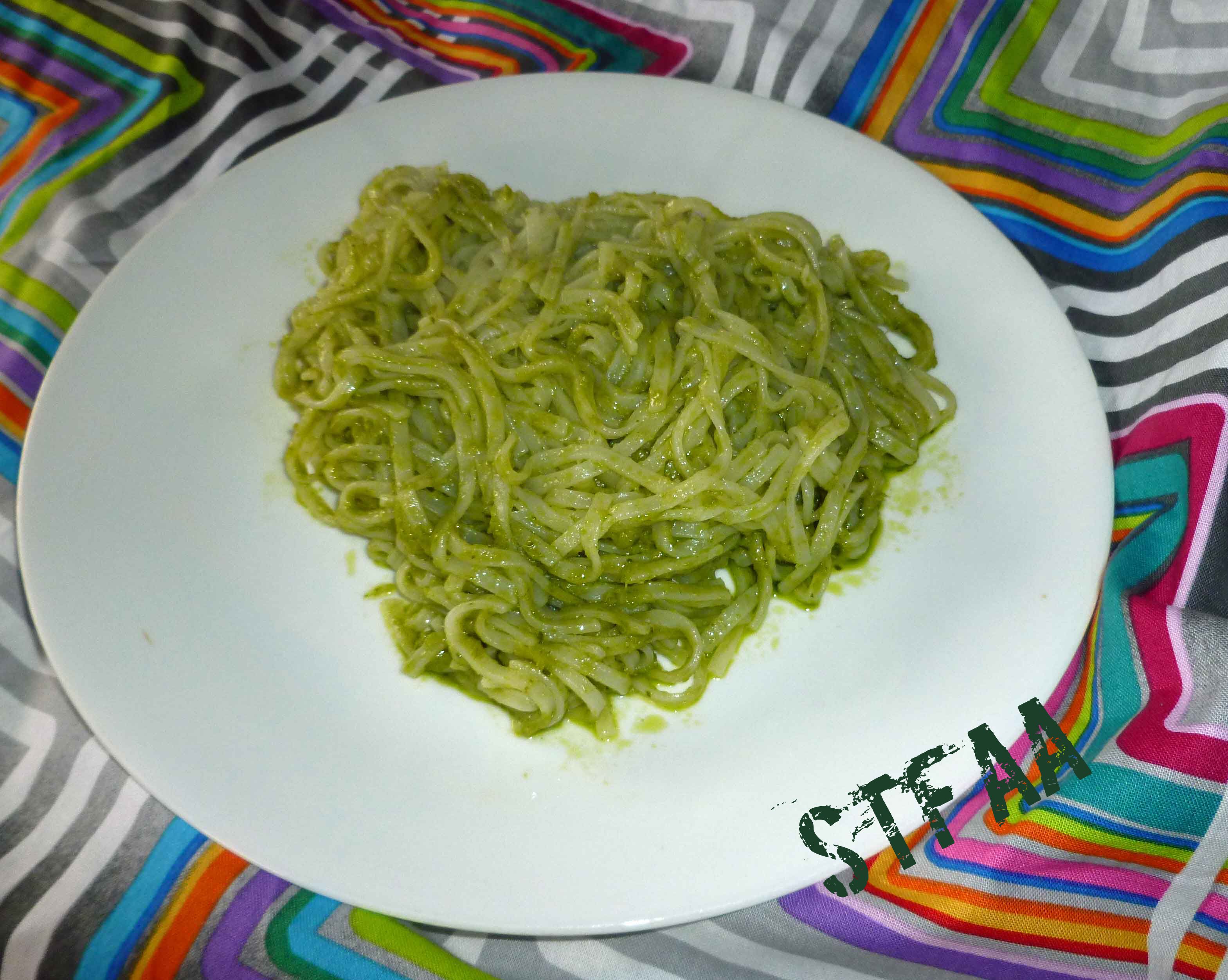 Garlic Scape Pesto Sauce mixed with rice noodles