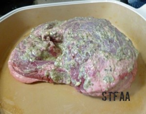 Bottom of lamb coated with wet rub