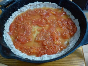 Whole tomatoes over crust