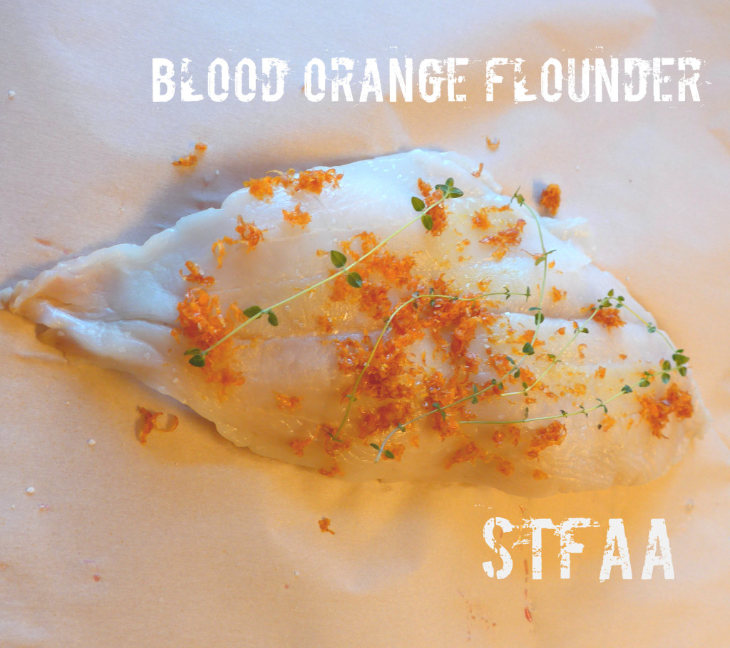 Blood Orange Flounder, pre-baking. Zest and fresh thyme on top, and I swear there are whole orange slices beneath.