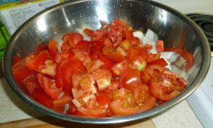 Tomatoes and onions chopped and ready to add to ground beef