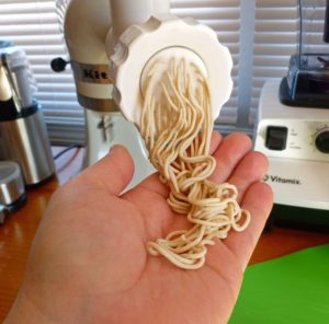 Spaghetti being extruded from the KitchenAid