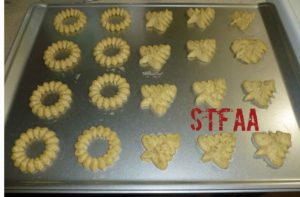 Spritz or Cookie Press Cookie dough after pressed onto cookie sheets before baking