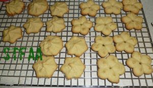 Spritz or Cookie Press Cookies cooling on rack