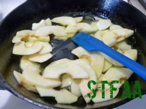 Apples cooking in nondairy spread