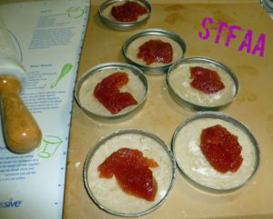 Adding the filling (apple plum butter)