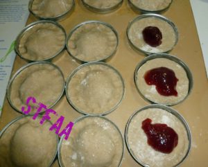 Some completed pastries and adding the filling (Nankin cherry jam)