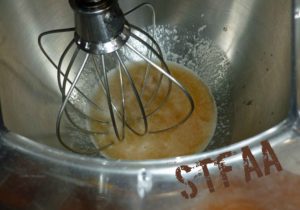 Aquafaba, cream of tartar, and vanilla extract before mixing